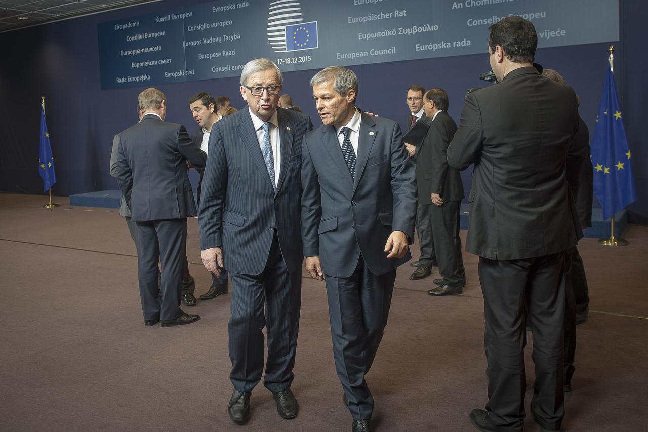 Jean-Claude Juncker , the president of the European Commission and  Romanian Prime Minister Dacian Ciolos during family photo of EU leaders at the first day of European Summit in Brussels, Belgium on 17.12.2015 by Wiktor Dabkowski/DPA/PIXSELL