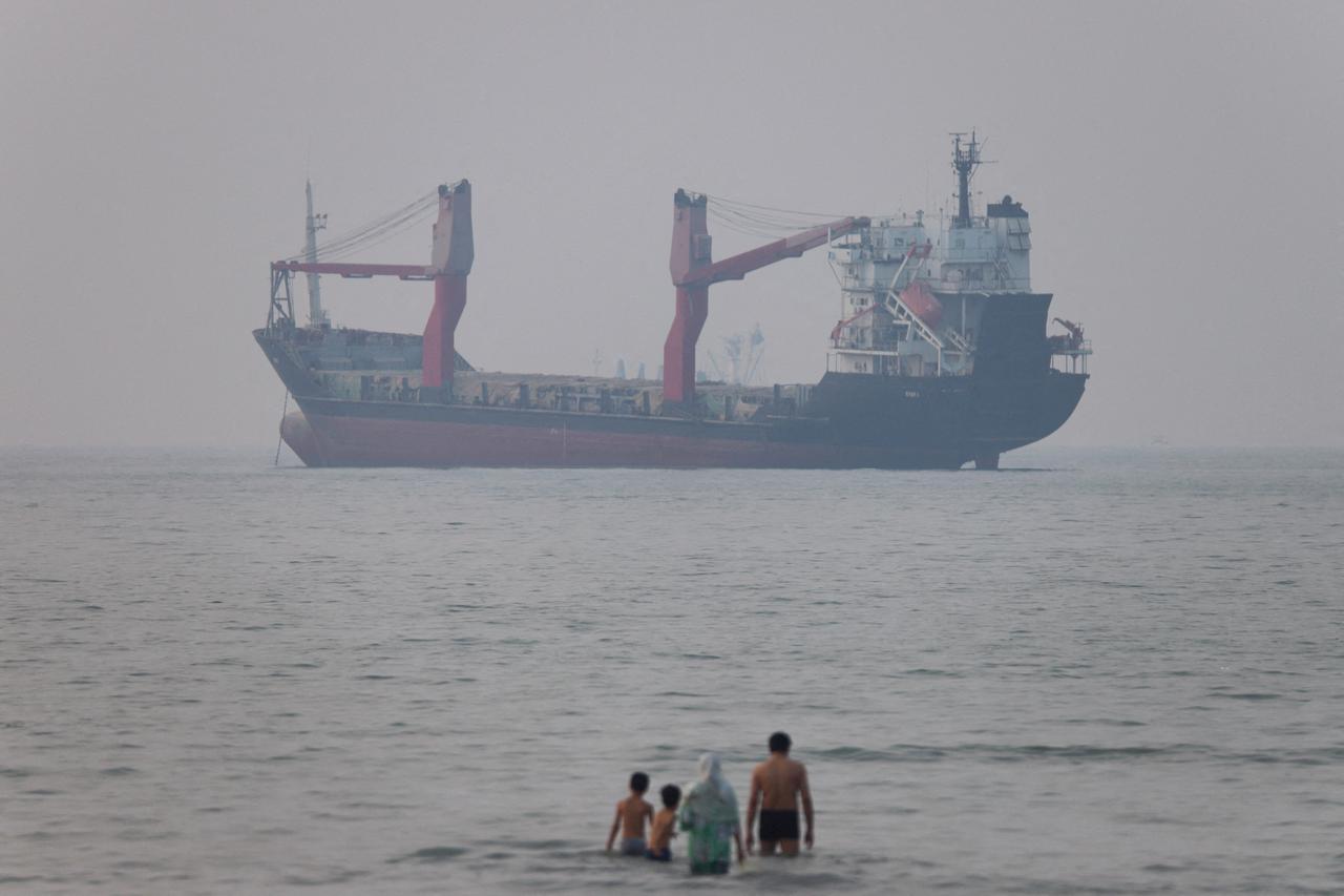 FILE PHOTO: Vessels in the Strait of Hormuz near the beach of Bandar Abbas