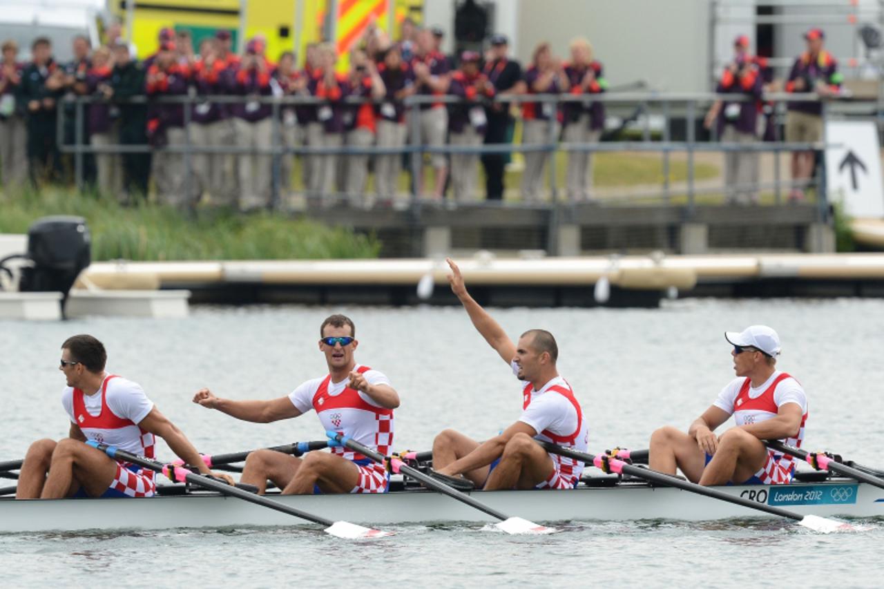 '(R-L) Croatia\'s David Sain, Martin Sinkovic, Damir Martin and Valent Sinkovic celebrate after winning the men\'s quadruple sculls semifinal A/B 1 of the rowing event during the London 2012 Olympic G