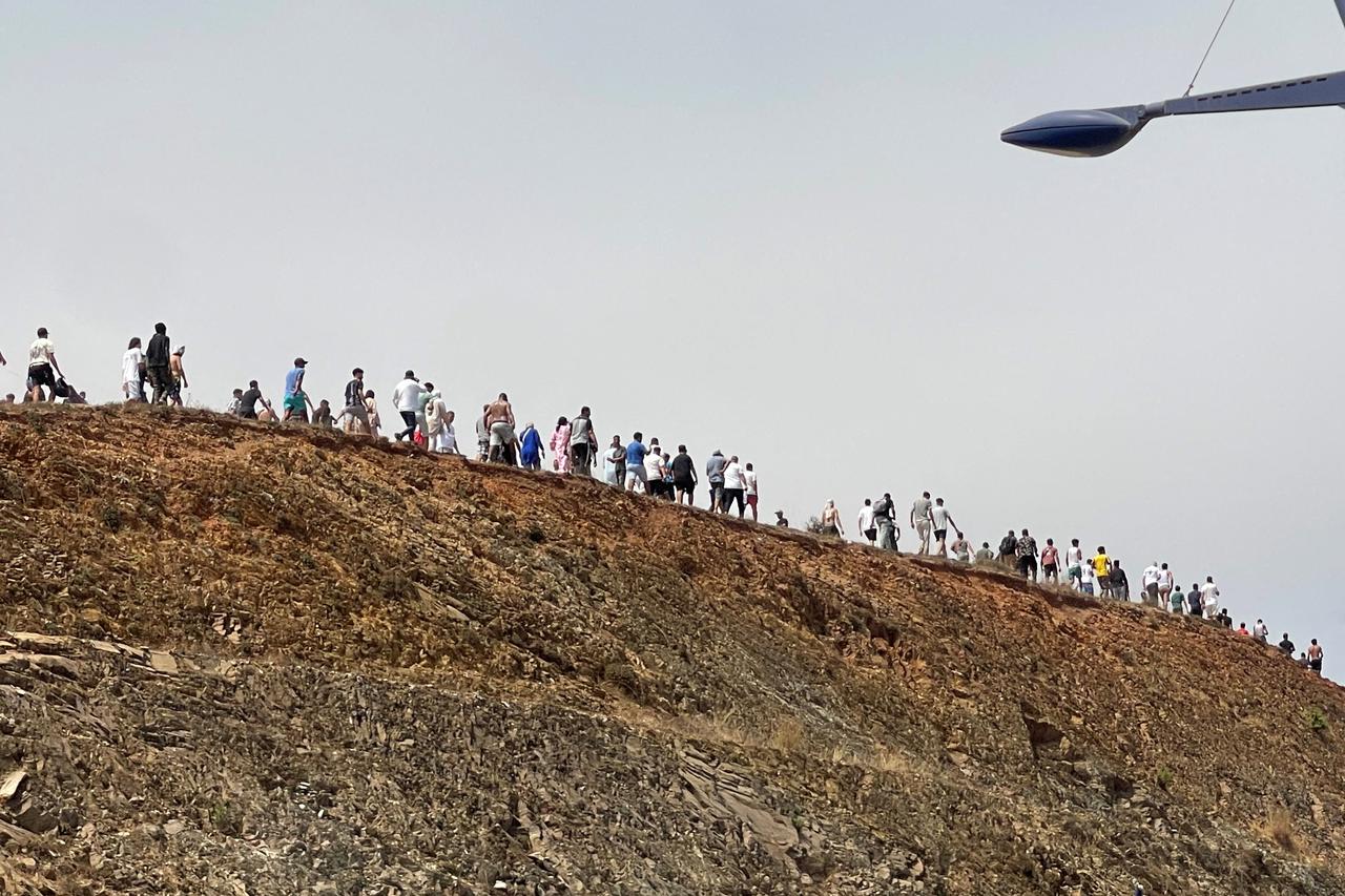 Migrants cross on foot into North African enclave of Ceuta from Morocco