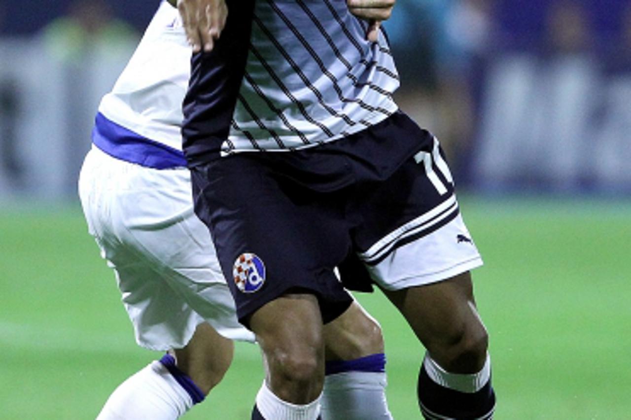 '18.09.2012., stadion u Maksimiru, Zagreb - Nogometna utakmica 1. kola UEFA Lige prvaka, GNK Dinamo - FC Porto. Jorge Sammir Cruz Campos, Steven Defour.  Photo: Goran Stanzl/PIXSELL'