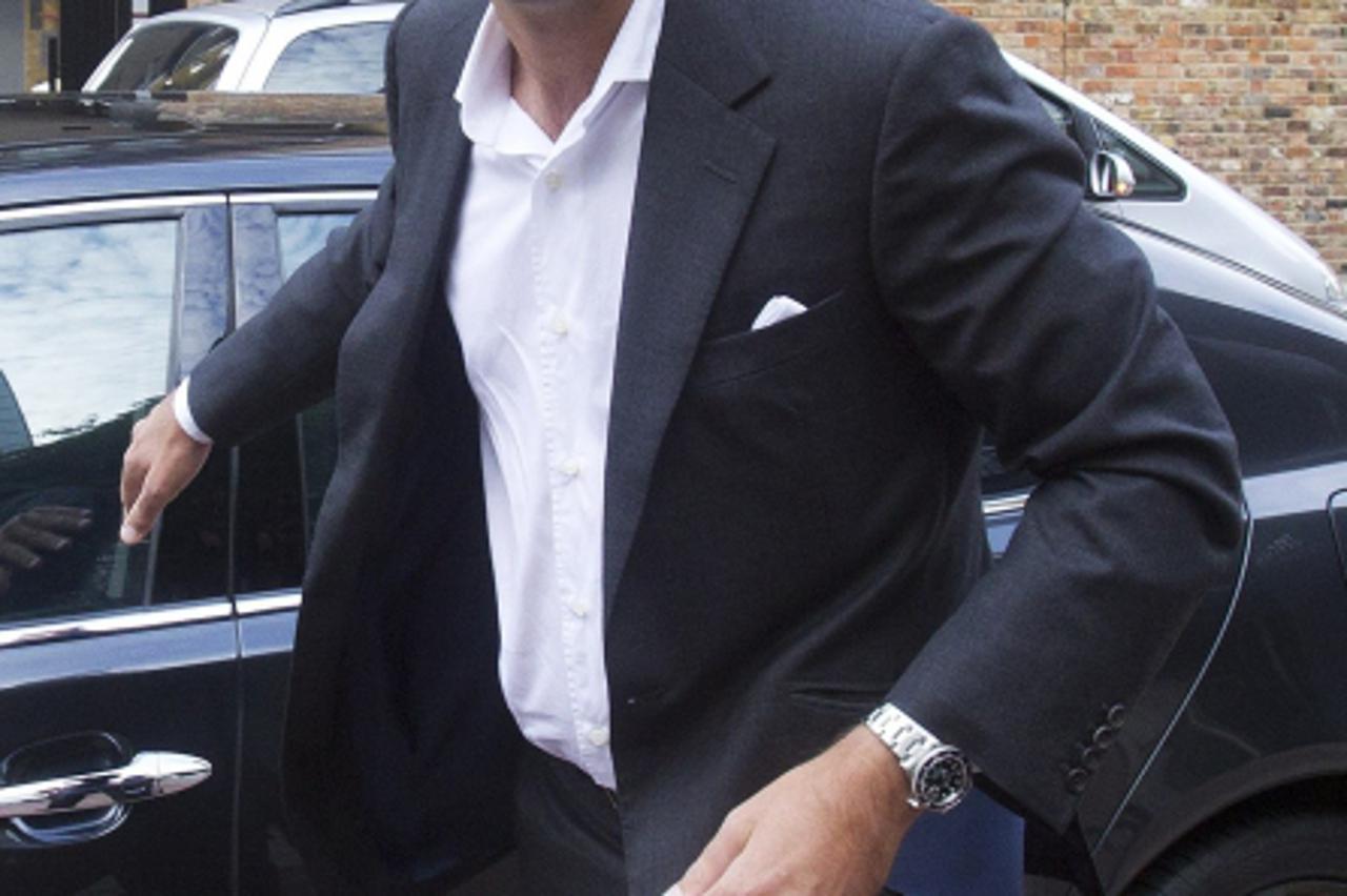 'News International Chairman James Murdoch arrives at News International in London July 12, 2011.  News Corporation CEO Rupert Murdoch fought to contain a crisis engulfing his media empire on Tuesday 