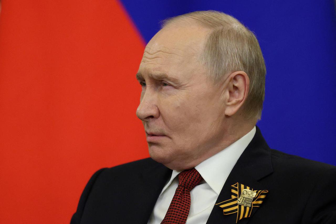 Russian President Vladimir Putin meets with Badra Gunba, the leader of Georgia's breakaway region of Abkhazia, in Moscow