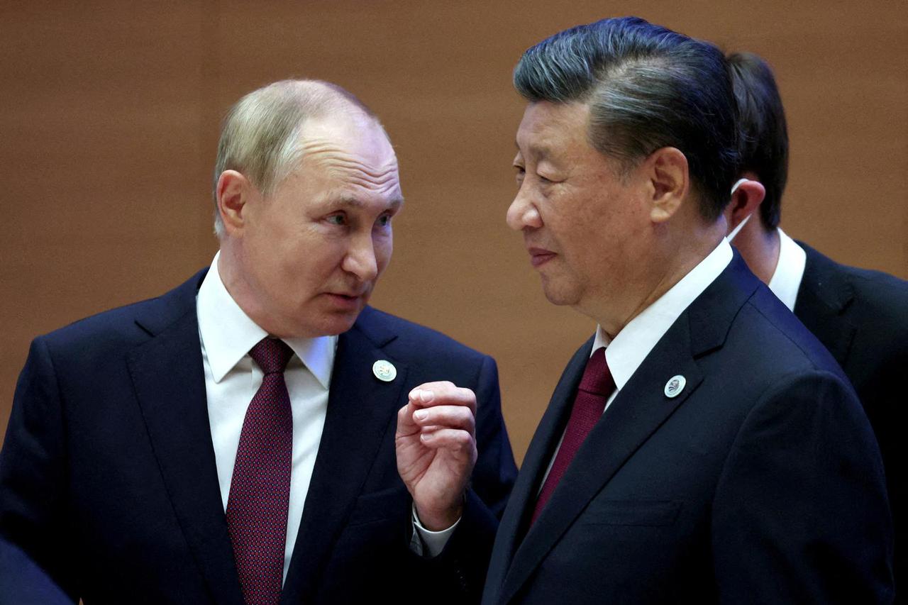 FILE PHOTO: China's Xi plans Russia visit as soon as next week - sources
