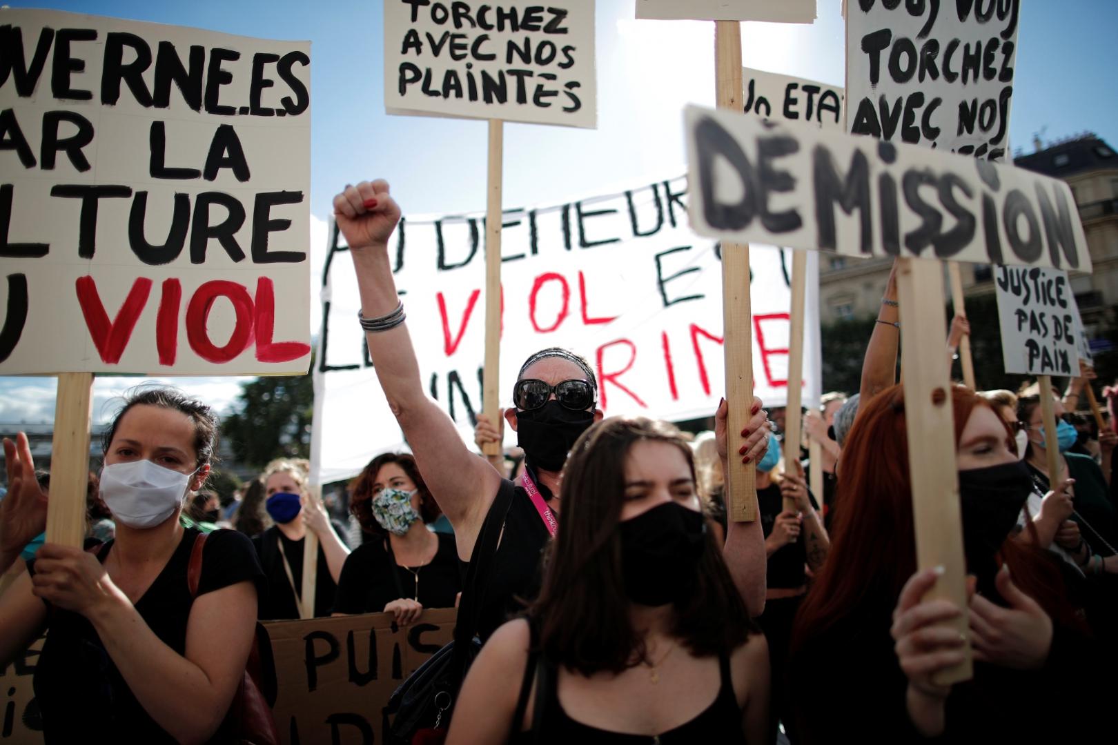 Feminist activists demonstrate against new government appointments in Paris A feminist activist gestures during a demonstration against the appointments of French Interior Minister Gerald Darmanin and Justice Minister Eric Dupond-Moretti in the new French government, in front of the city hall in Paris, France, July 10, 2020. REUTERS/Benoit Tessier BENOIT TESSIER