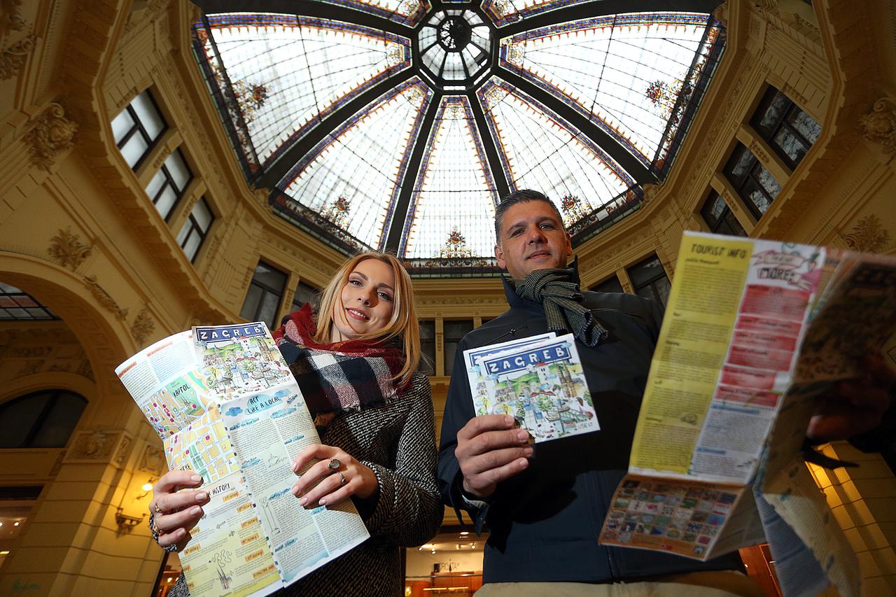 25.11.2015., Zagreb - Sven Darrer i Anita Tutic s kartom Zagreba Use-it u sklopu koje predlazu lokacije namijenjeni mladim putnicima.  Photo: Goran Stanzl/PIXSELL