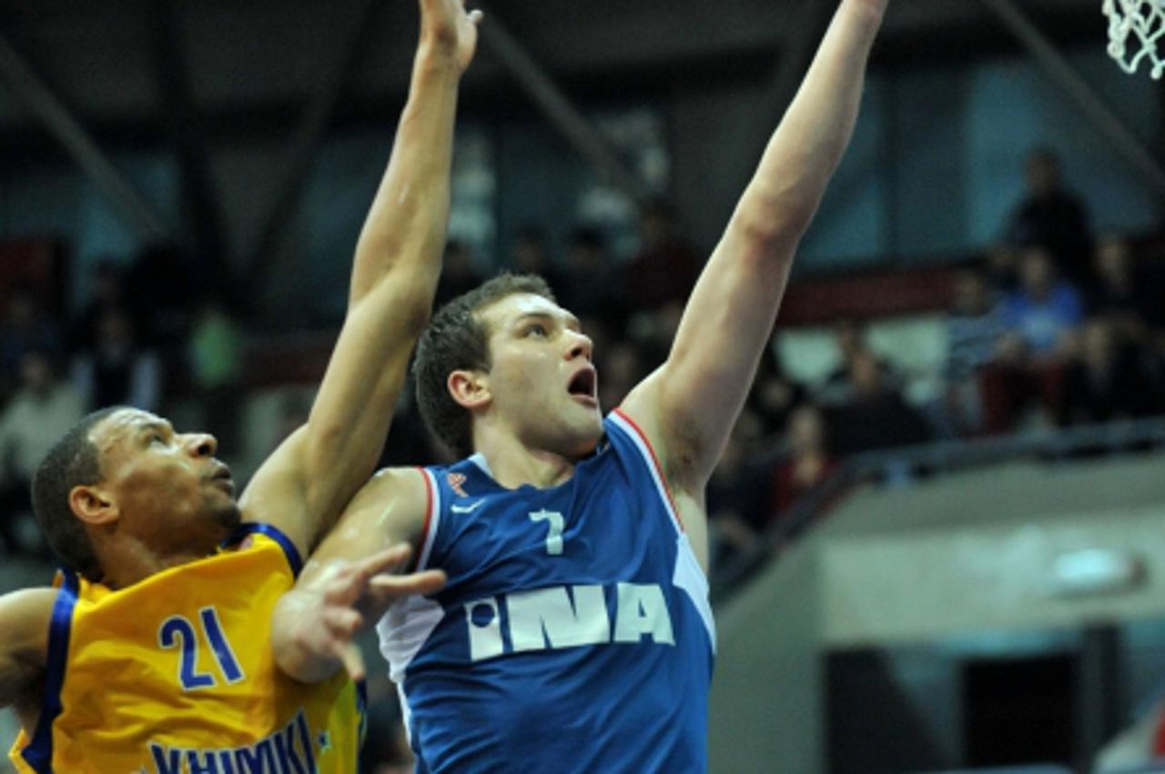 '03.03.2010., Zagreb, Hrvatska - Kosarkaska utakmica Euroleague Basketball u dvorani KC Drazen Petrovic. Utakmica izmedju KK Cibona i BC Khimki. Kelly McCarty, Bojan Bogdanovic. Photo: Antonio Bronic/