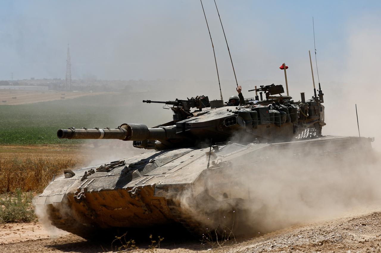 A tank manoeuvres near the Israel-Gaza border