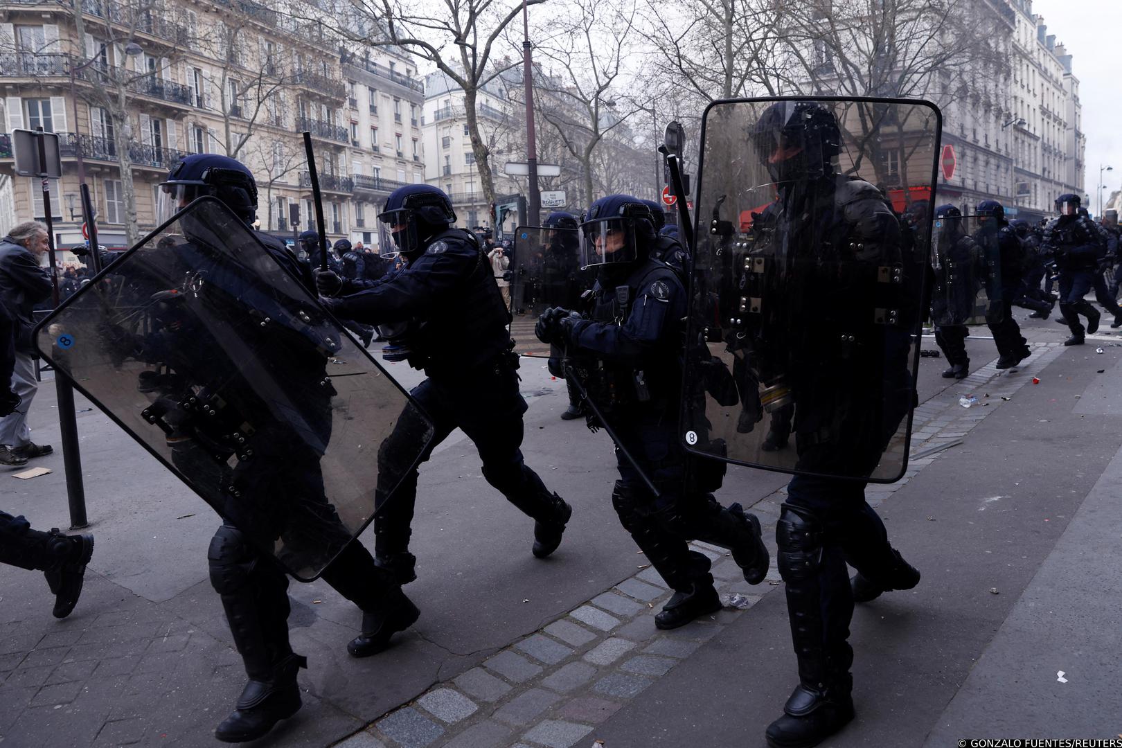 French riot police react during clashes at a demonstration as part of the tenth day of nationwide strikes and protests against French government's pension reform, in Paris, France, March 28, 2023. REUTERS/Gonzalo Fuentes Photo: GONZALO FUENTES/REUTERS