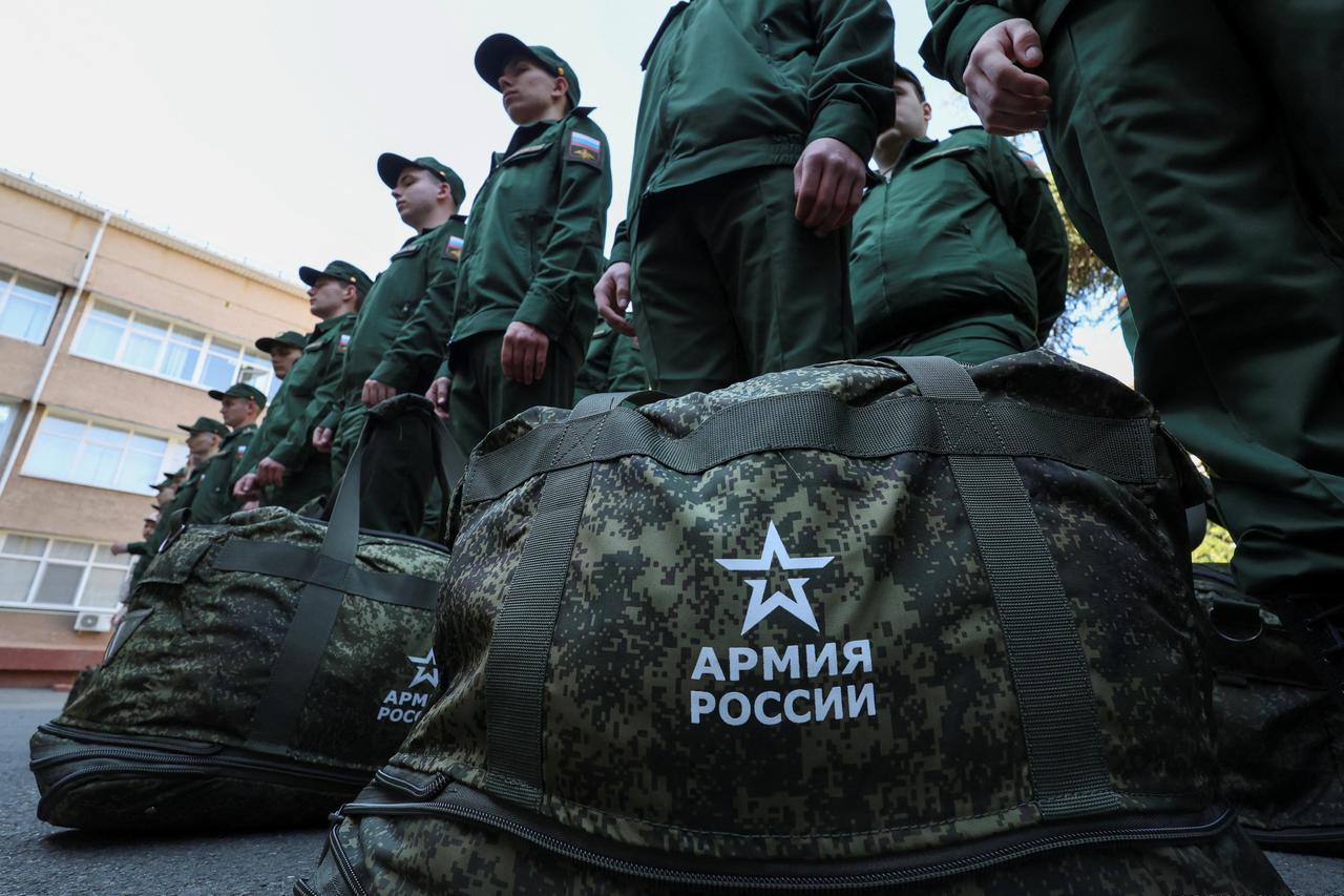 Russian conscripts depart for garrisons from a recruitment centre in Simferopol