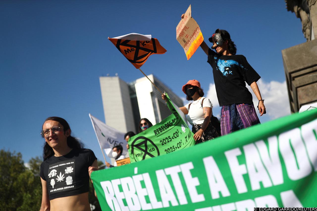 Members of environmental organizations hold a protest against climate change on Earth Day in Mexico City