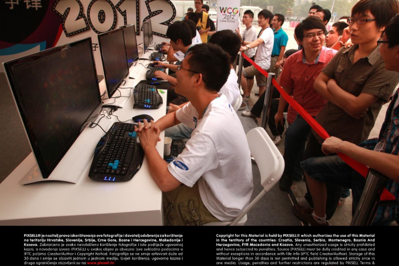 'WORLD RIGHTS NO USA, FRANCE, AUSTRALIA.   Chinese students compete in a cyber war-game contest in downtown Beijing, China 26/08/2012  Cyber crime in China poses a serious threat to the fast-growing e