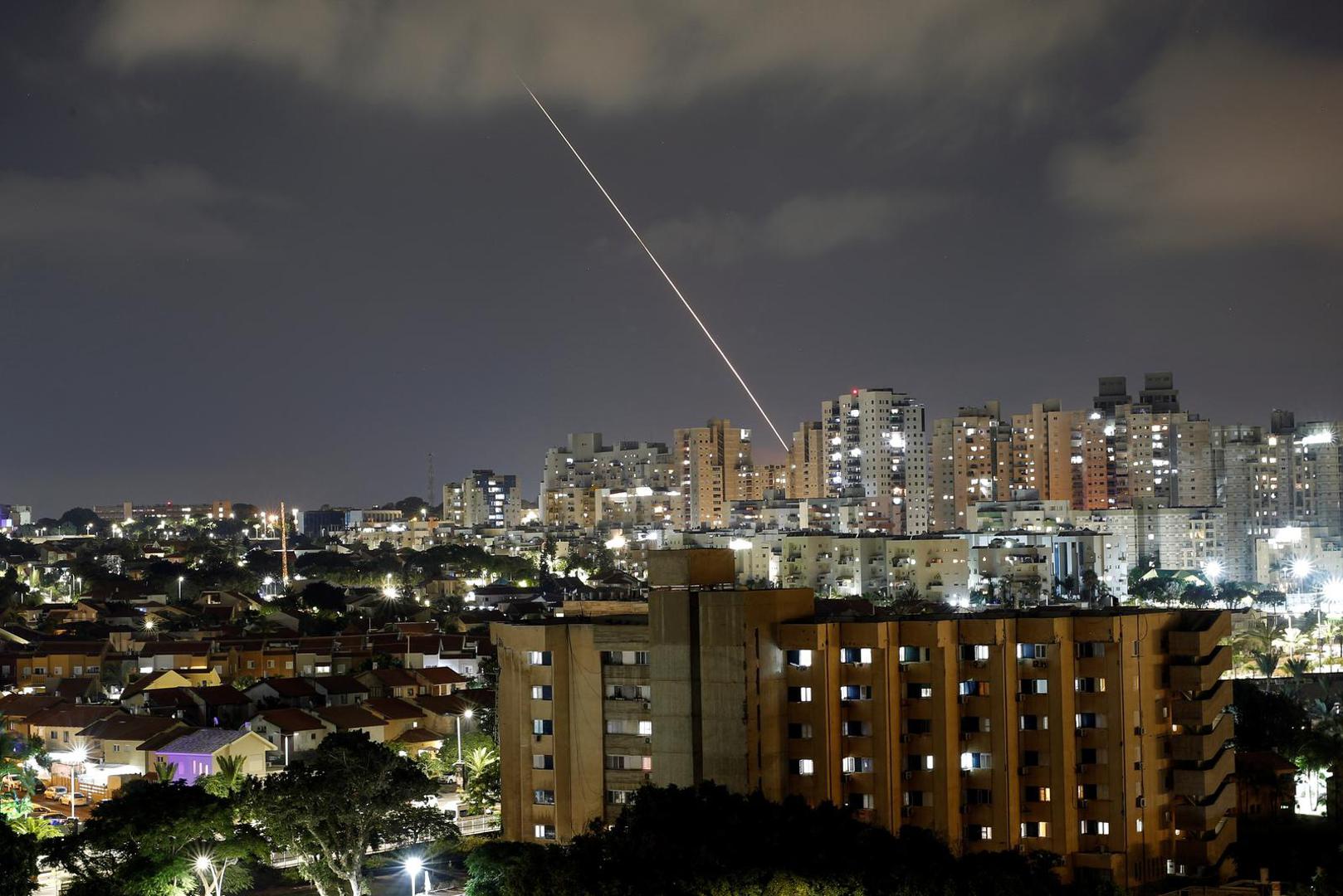 A streak of light is seen as a rocket has been launched from the Gaza Strip towards Israel, as seen from Ashkelon, Israel August 5, 2022. REUTERS/Amir Cohen Photo: AMIR COHEN/REUTERS