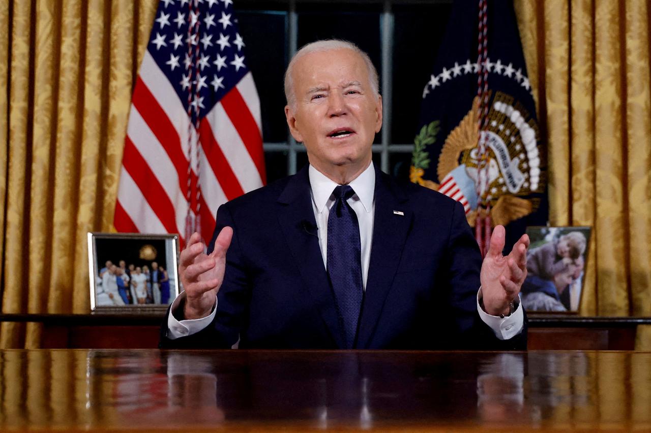 FILE PHOTO: President Joe Biden delivers an address to the nation from the Oval Office of the White House in Washington