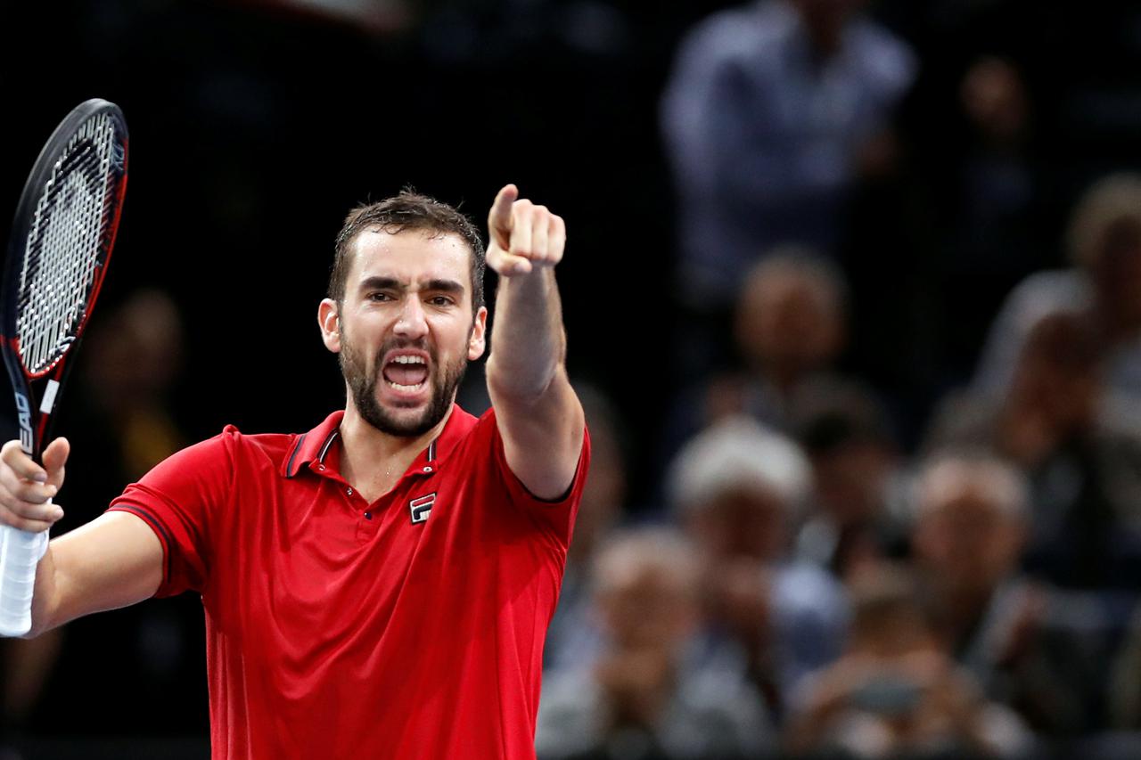 Tennis - Paris Masters tennis tournament men's singles quarterfinals - Novak Djokovic of Serbia v Marin Cilic of Croatia - Paris, France - 4/11/2016 - Cilic reacts after defeating Djokovic. REUTERS/Gonzalo Fuentes