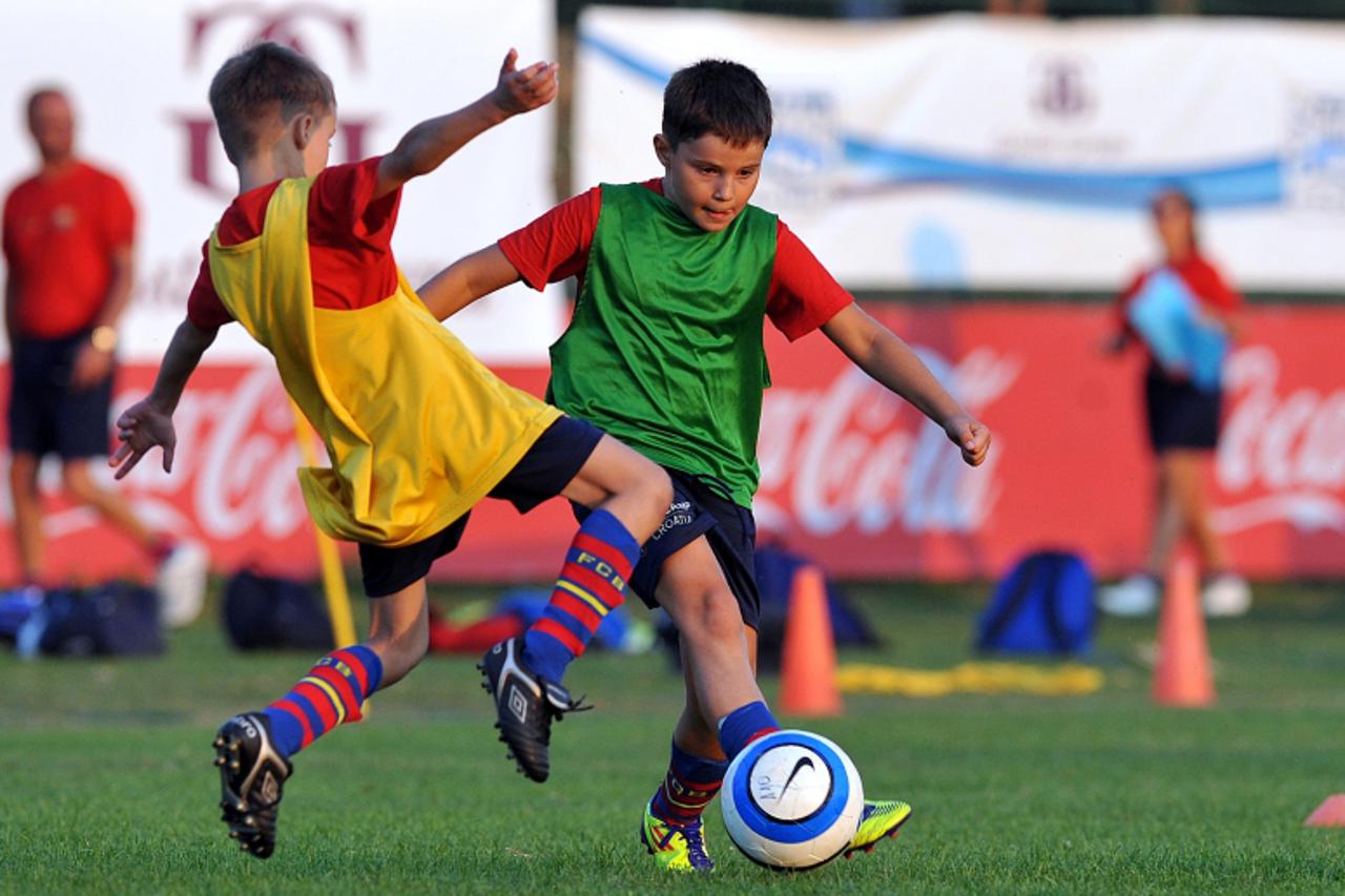 \'30.08.2011., Nogometni tereni na Savici - Trening kamp Barcelone odrzan je na nogometnim terenima na Savici gdje su dosla djeca iz svih krajeva Hrvatske.  Photo: Goran Stanzl/PIXSELL\'
