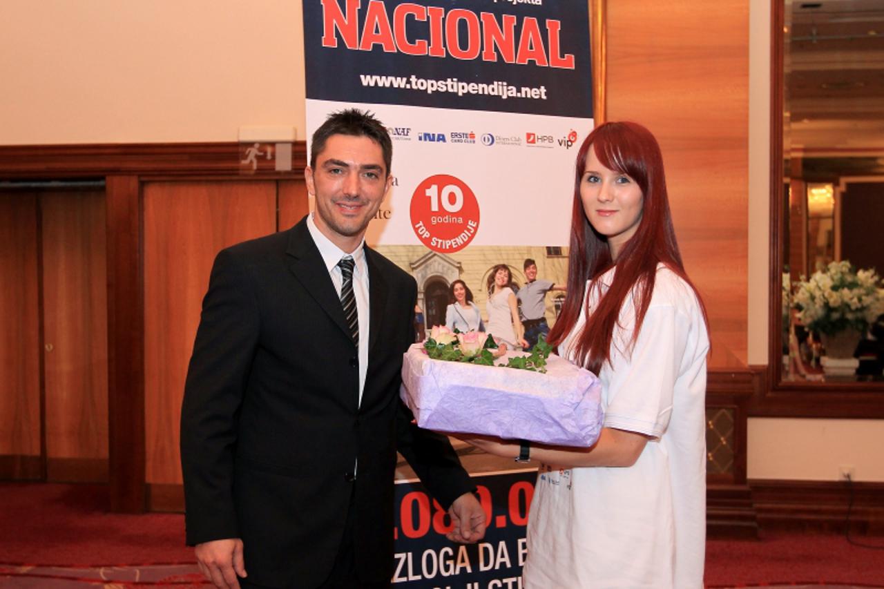 '06.07.2011.,Zagreb - U hotelu Westin odrzana je svecano proglasenje dobitnika Top stipendija za top studente 2011 koju je organizirao tjednik Nacional. Mislav Simatovic sa najboljom studenticom Mirna