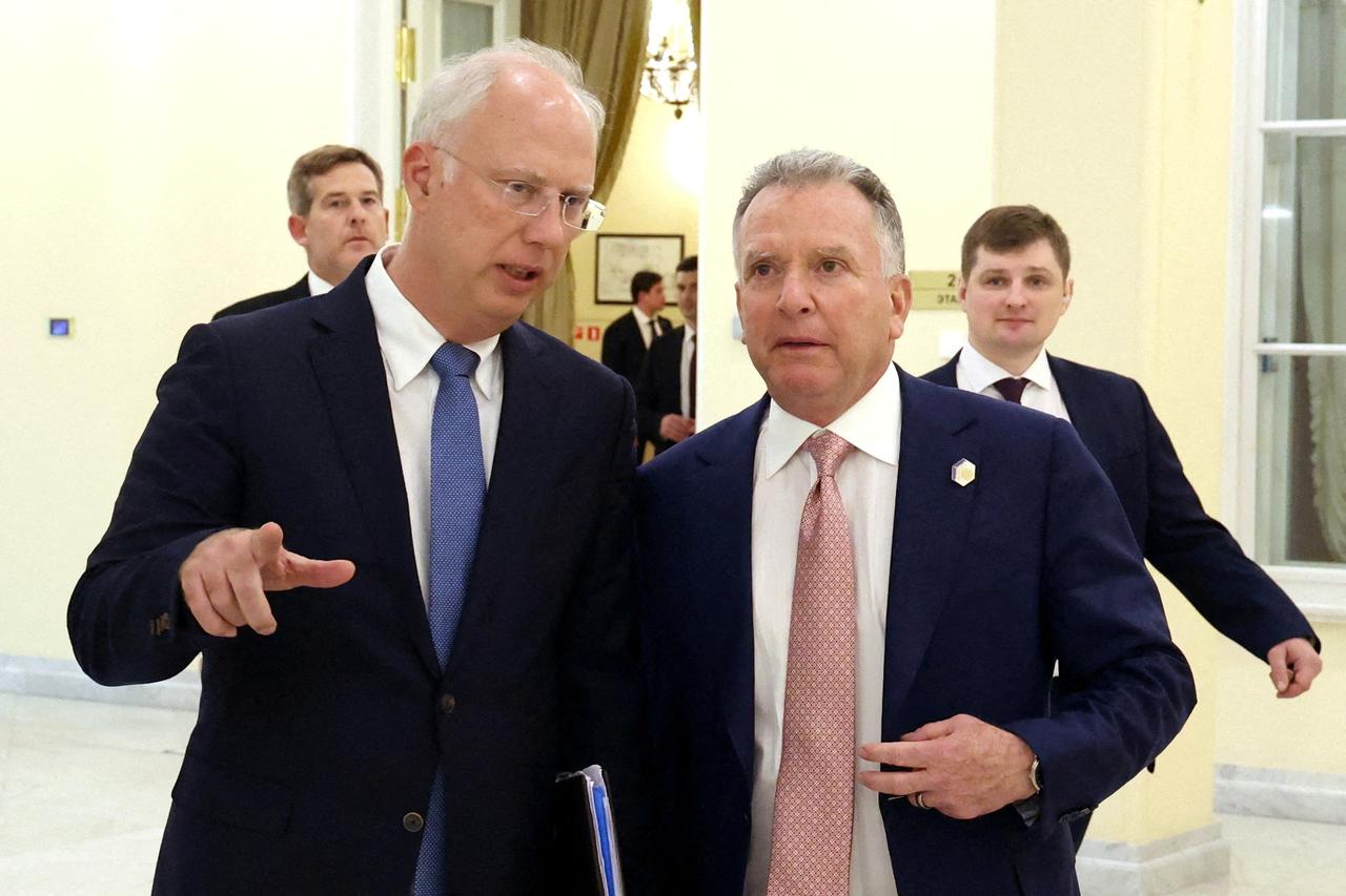 FILE PHOTO: Russian envoy Kirill Dmitriev talks to U.S. presidential envoy Steve Witkoff  in in Saint Petersburg, Russia