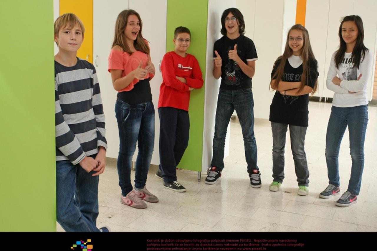 '09.11.2011., Zagreb - Osnovna skola Matije Gupca na Kneziji. Ucenici 7 c razreda poziraju za temu o skolskim kutama. Photo: Jurica Galoic/PIXSELL'