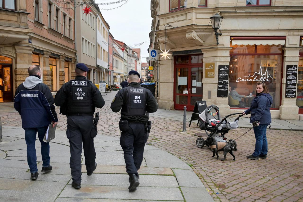 FILE PHOTO: Public order office and police check coronavirus measures in Pirna