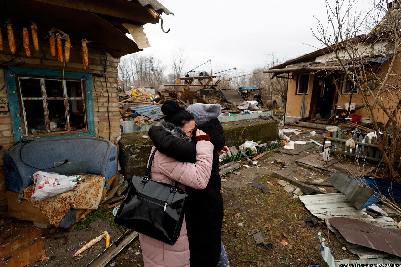 Local residents resident react after Russian missile strike, in Kyiv