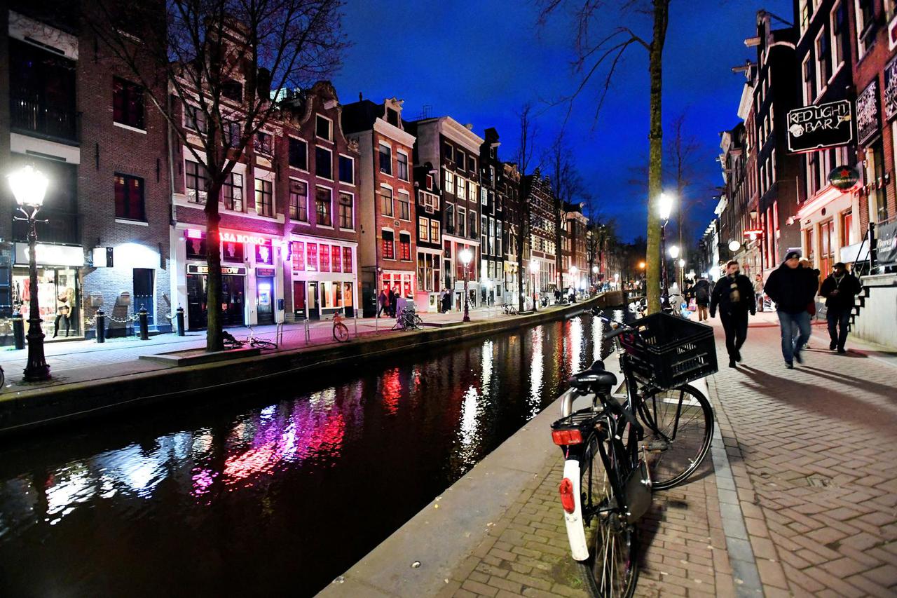 FILE PHOTO: Several popular sex clubs in Amsterdam's "Red Light" district closes their doors in response to a rapidly expanding coronavirus outbreak, in Amsterdam
