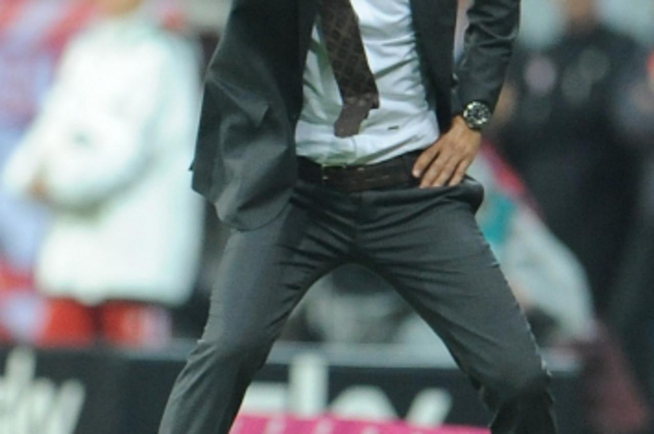 'Munich\'s head coach Pep Guardiola is pictured during the Bundesliga soccer match between FC Bayern Munich and Borussia Moenchengladbach at Allianz Arena in Munich, Germany, 09 August 2013. Photo: An