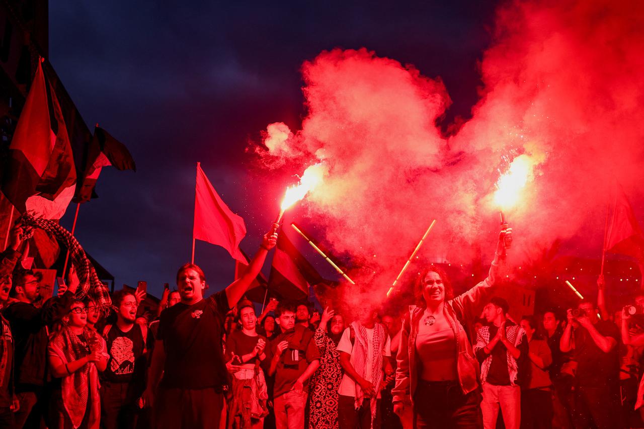 Pro-Palestinian demonstrators protest to condemn the interception of some of the vessels of the Global Sumud Flotilla, in Barcelona