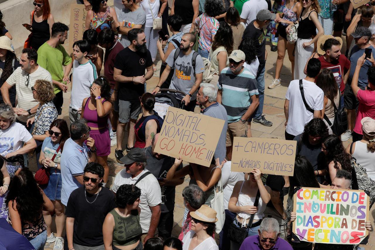 People demonstrate against mass tourism in Malaga