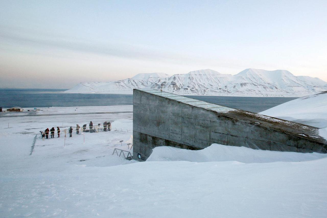FILE PHOTO: Television crews stand outside the Global Seed Vault before the opening ceremony in Longyearbyen