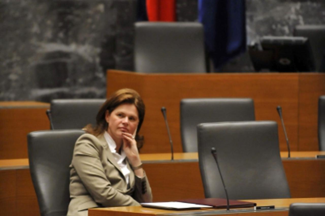 'Slovenian Prime Minister Alenka Bratusek sits in parliament after her cabinet was confirmed in Ljubljana March 20, 2013. Bratusek said on Wednesday she was determined to revive the economy, overhaul 