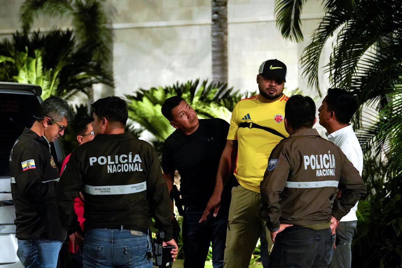 Members of Ecuador's Armed Forces stand stand guard after an armed attack at Jose Joaquin de Olmedo International Airport, in Guayaquil