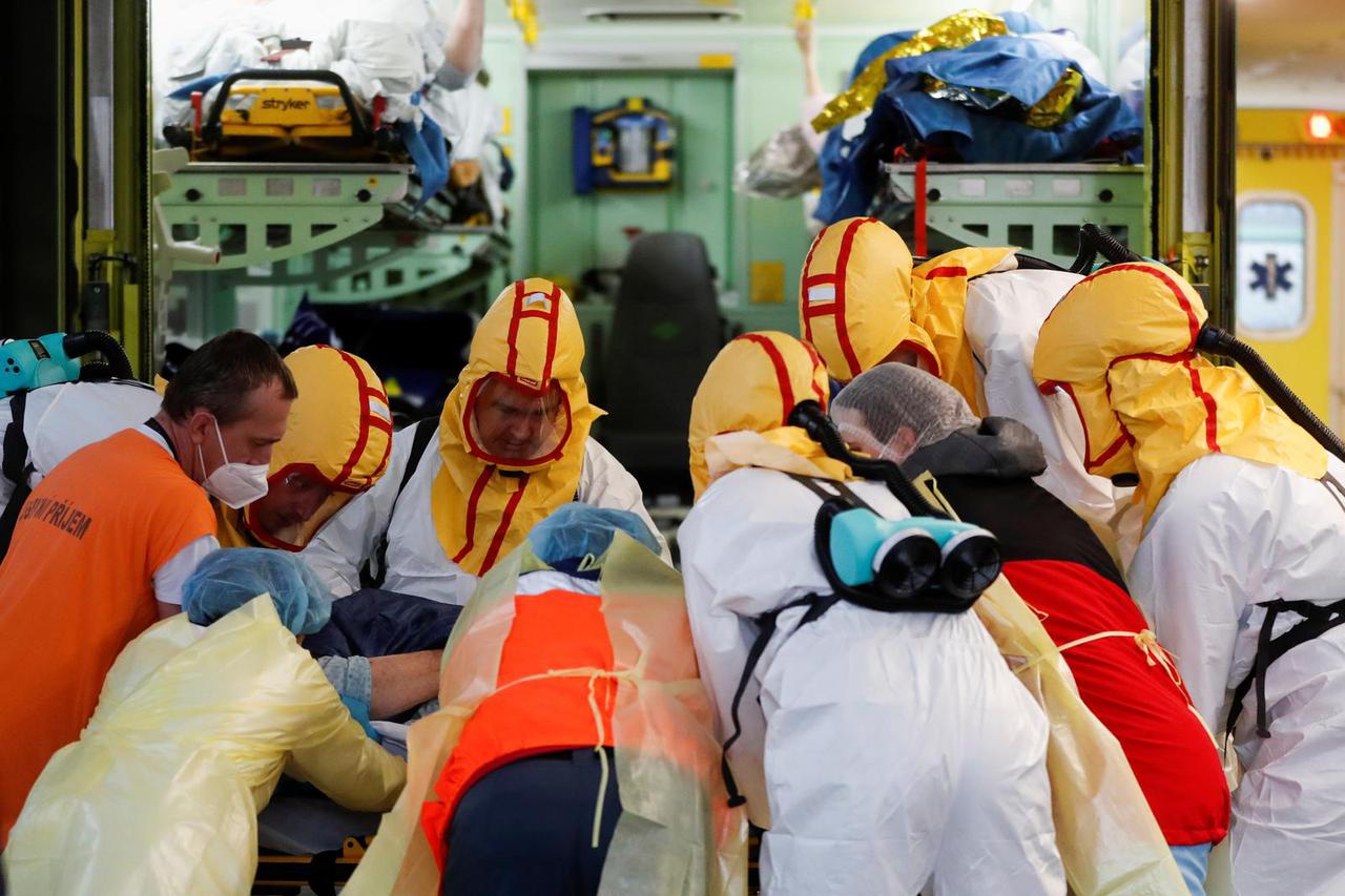 Medical staff members transport COVID-19 patients from Brno to Prague