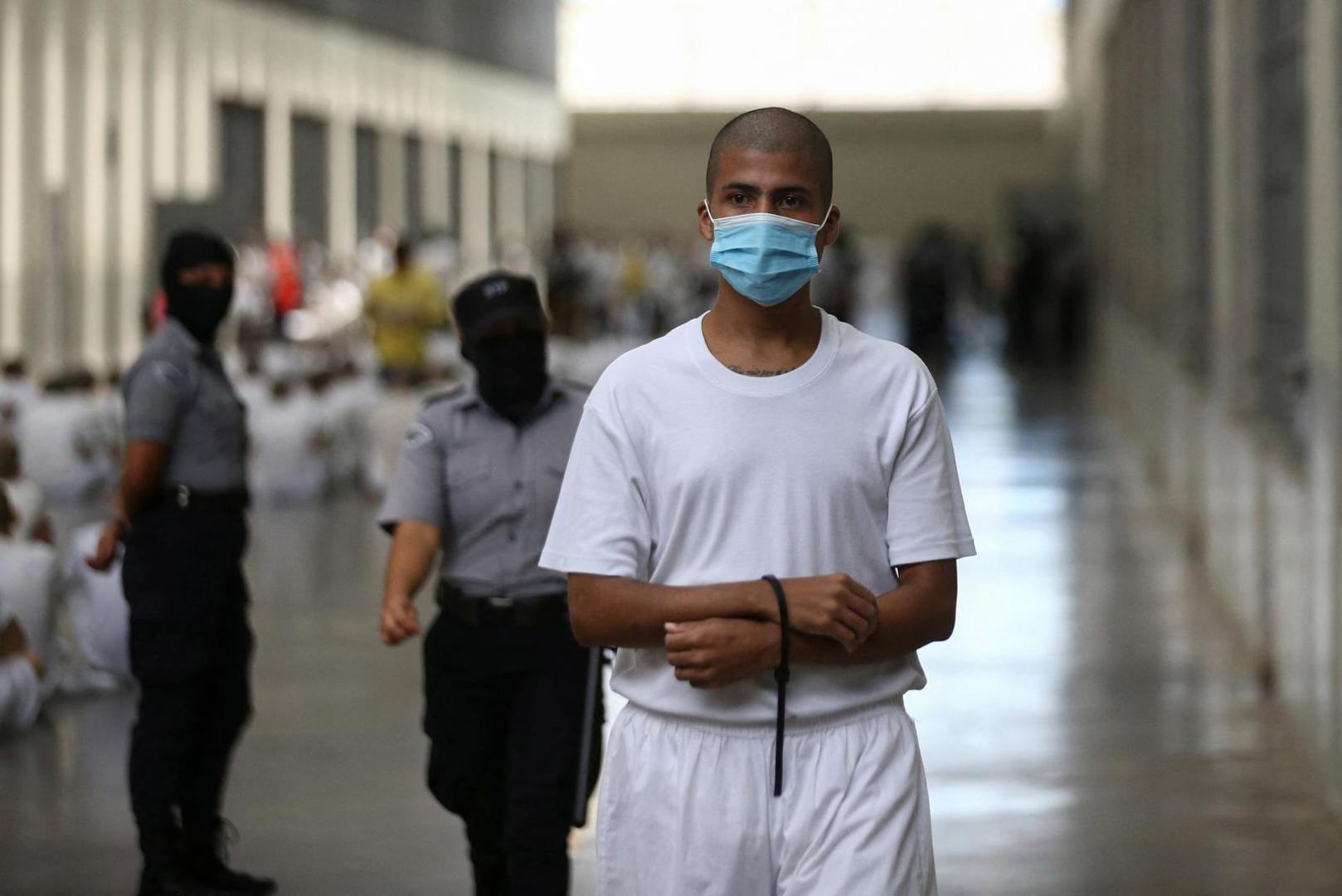 An inmate walks to his cell, during a tour in the "Terrorism Confinement Center" (CECOT) complex, which according to El Salvador's President, Nayib Bukele, is designed to hold 40,000 inmates, in Tecoluca, El Salvador October 12, 2023. REUTERS/Jose Cabezas Photo: Jose CABEZAS/REUTERS