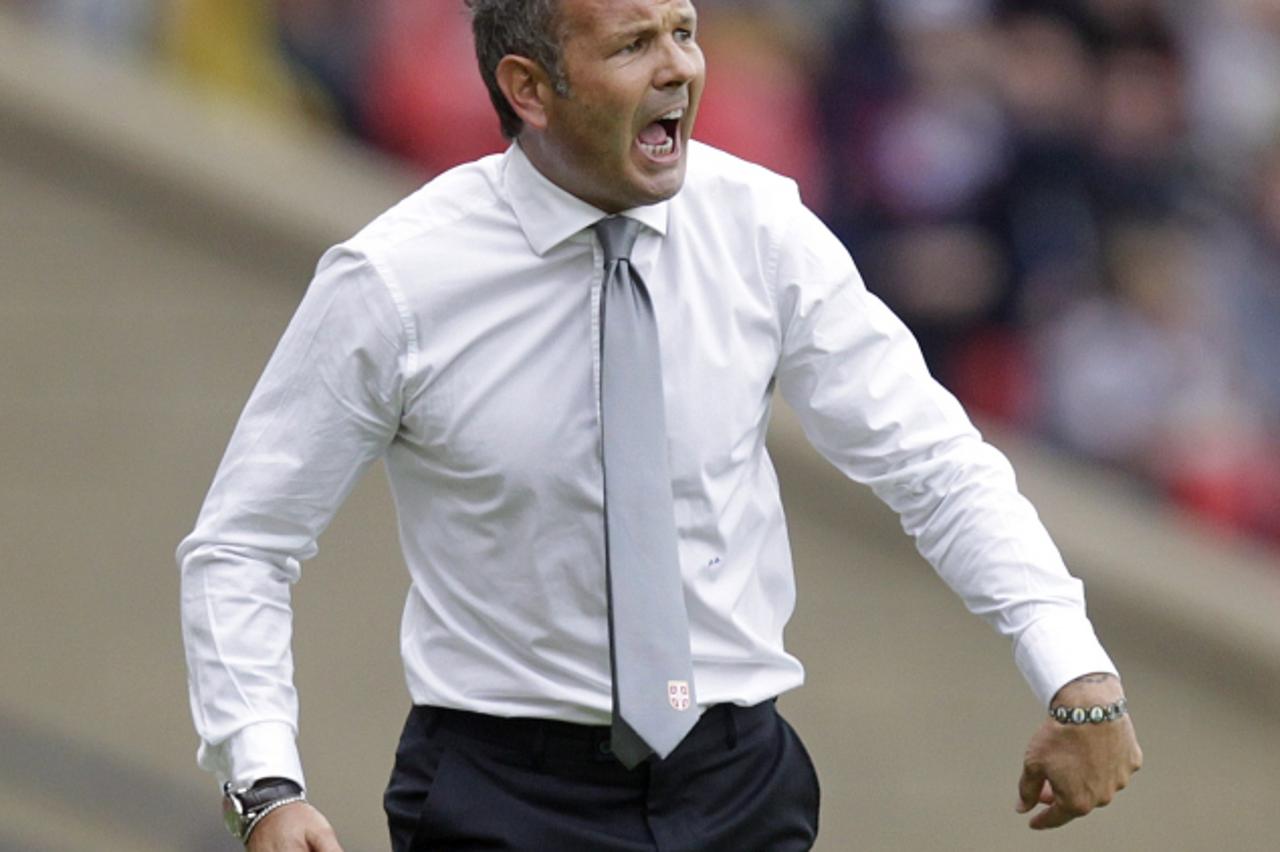 'Serbia\'s manager Sinisa Mihajlovic reacts during a FIFA 2014 World Cup, group A, qualifying football match between Serbia and Scotland at Hampden Park, in Glasgow, Scotland, on September 8, 2012.  A