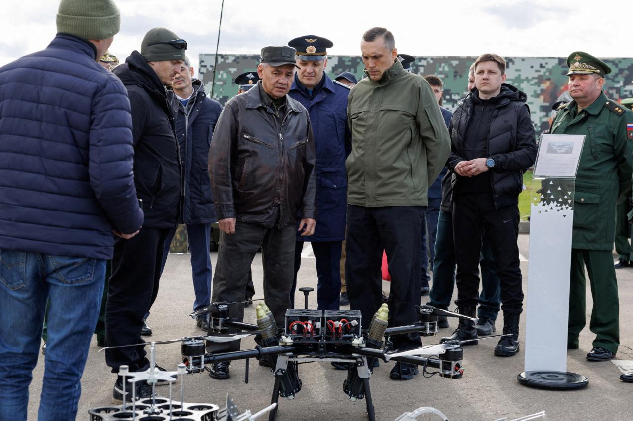 Russian Defence Minister Sergei Shoigu inspects drones in the Moscow military district
