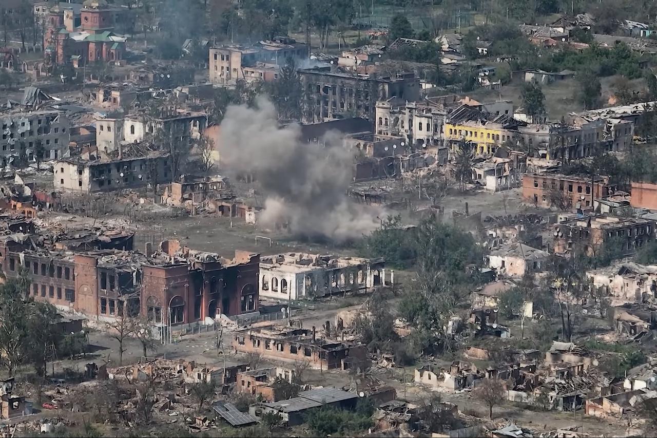 A drone view shows damaged property, in Vovchansk