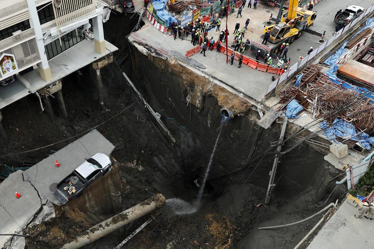 A massive sinkhole opens on Samsen Road near Vajira Hospital, in Bangkok