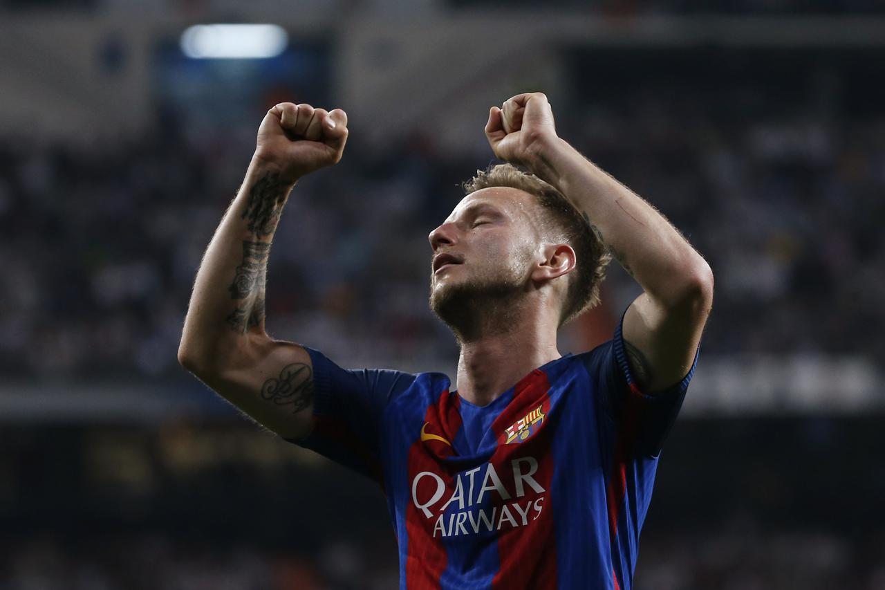 Football Soccer - Real Madrid v FC Barcelona - Spanish Liga Santander - Santiago Bernabeu, Madrid, Spain - 23/4/17 Barcelona's Ivan Rakitic celebrates scoring their second goal  Reuters / Susana Vera Livepic