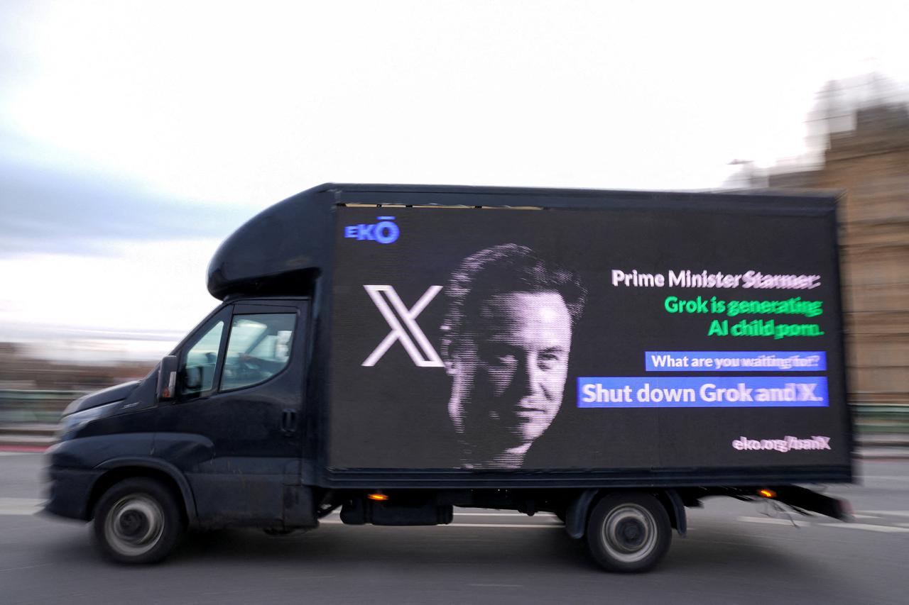 FILE PHOTO: A billboard organised by corporate accountability group Eko passes through Westminster urging the Prime Minister to stand up to Elon Musk and ban X and Grok, in London