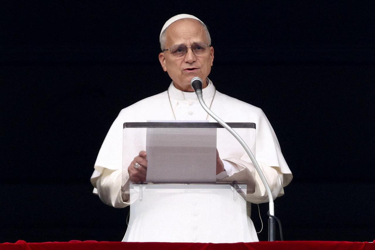 FILE PHOTO: Pope Leo XIV leads the Angelus prayer at the Vatican