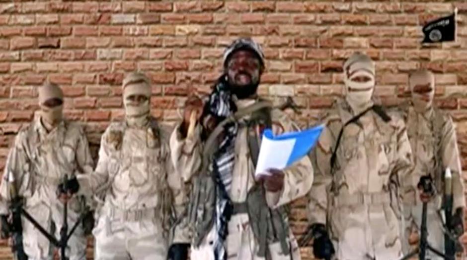 FILE PHOTO: Leader of one of the Boko Haram group's factions, Abubakar Shekau speaks in front of guards in an unknown location in Nigeria
