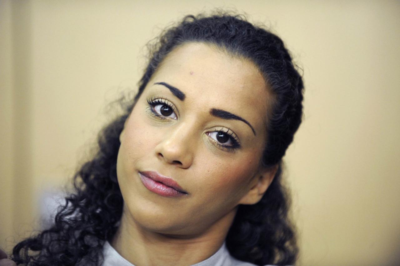 'German pop star Nadja Benaissa waits for the beginning of another session of her trial in the district court house in the western German city of Darmstadt on August 25, 2010. Benaissa, a singer of th