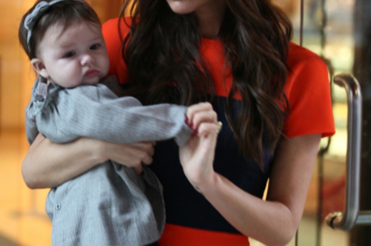 \'Victoria Beckham and baby Harper in NY on November 15, 2011. Photo: Press Association/Pixsell\'
