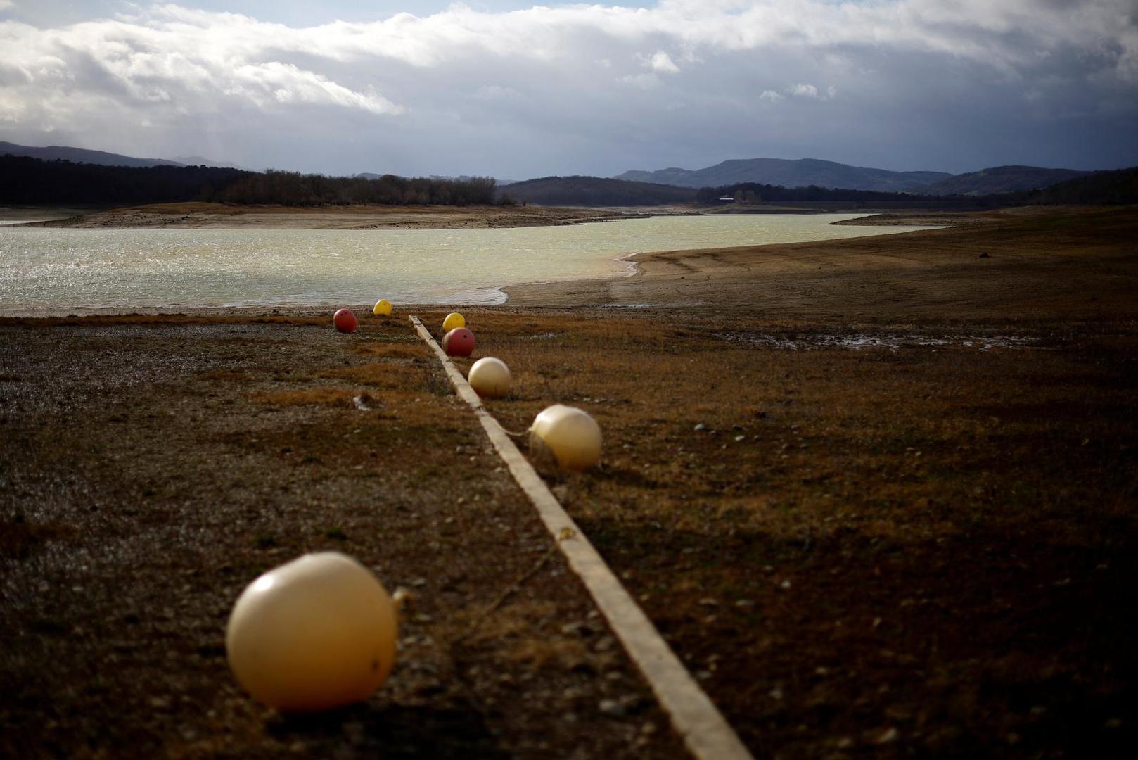 A view shows the partially dry Lake Montbel at the foot of the Pyrenees Mountains as France faces records winter dry spell raising fears of another summer of droughts and water restrictions, March 14, 2023.  REUTERS/Sarah Meyssonnier Photo: Sarah Meyssonnier/REUTERS