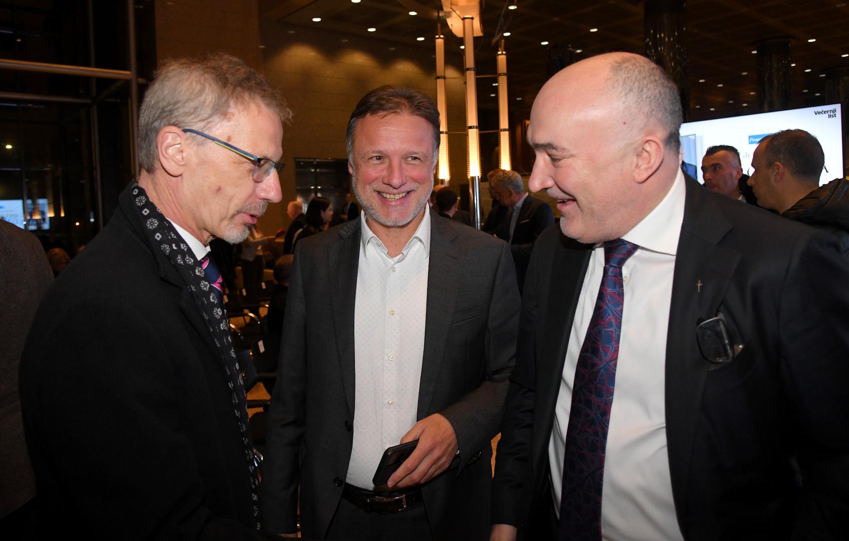16.01.2023., Zagreb - U Nacionalnoj i sveucilisnoj knjiznici odrzana je promocija 2. dopunjenog izdanja knjige "Diplomatska oluja" Mate Granica. guverner Hrvatske narodne banke Boris Vujcic, predsjednik Sabora Gordan Jandrokovic, predstavnik Styria Media Grupe u Hrvatskoj Ivan Tolj Photo: Josip Regovic/PIXSELL