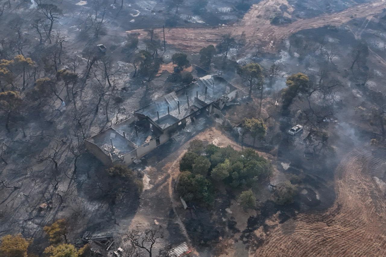 Wildfire burns in Greece