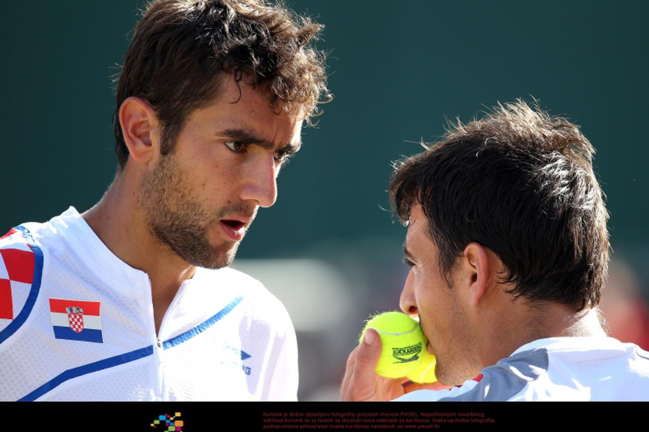 '01.08.2012., Engleska, London - Olimpijske igre London 2012.Parovi, Marin Cilic i Ivan Dodig - Johan Brunstrom i Robert Lindstedt.  Photo: Sanjin Strukic/PIXSELL'