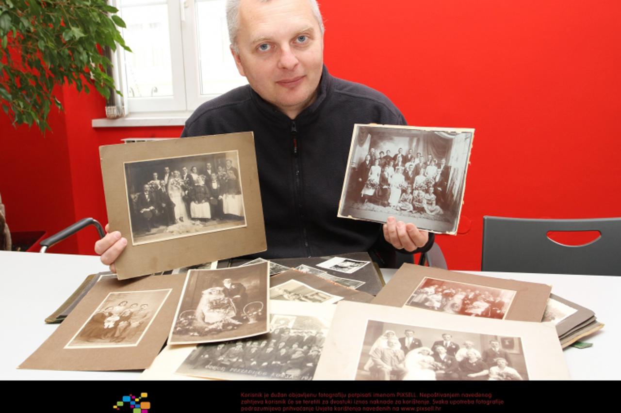 '15.02.2012. Karlovac - Fotograf Dinko Neskusil skuplja stare fotografije Karlovca i Karlovcana, koje objavljuje na portalu Kafotka.net. Photo: Kristina Stedul Fabac/PIXSELL'