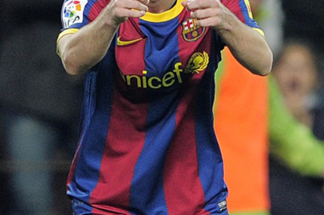 'Barcelona\'s Argentinian forward Lionel Messi celebrates his goal during the Copa del Rey (King\'s Cup) football match FC Barcelona vs Real Betis on January 12, 2011 at the Camp Nou stadium in Barcel